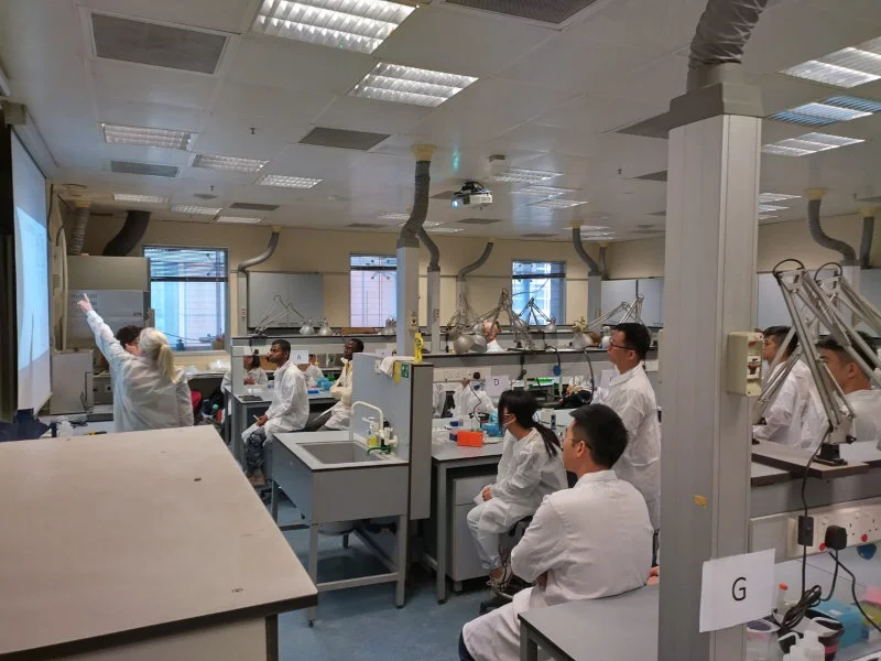 Participants learning eDNA laboratory dos and don’ts from expert.