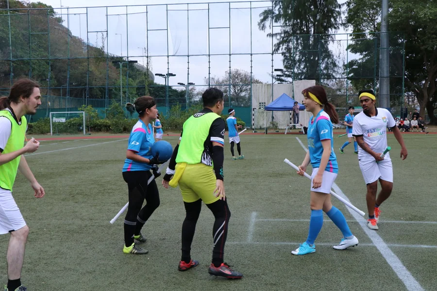 Seekers (players with yellow headbands) from both teams trying to catch the snitch