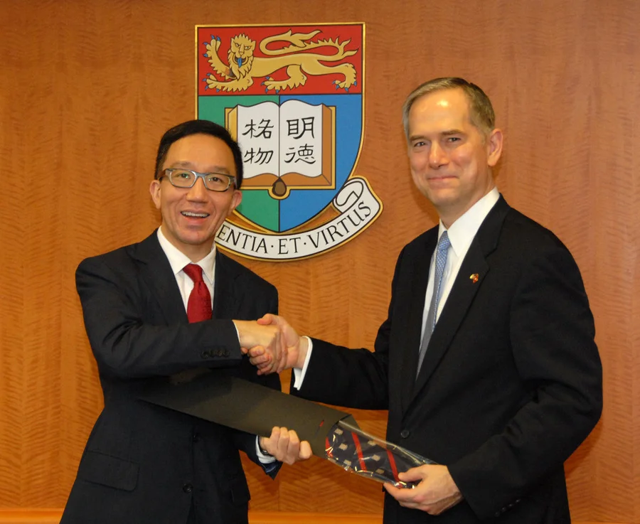 Dean Leung and CG Hart exchanged souvenir after the visit.  Dean Leung received a challenge coin from CG Hart’s personal collection while a Faculty tie was presented to CG Hart.