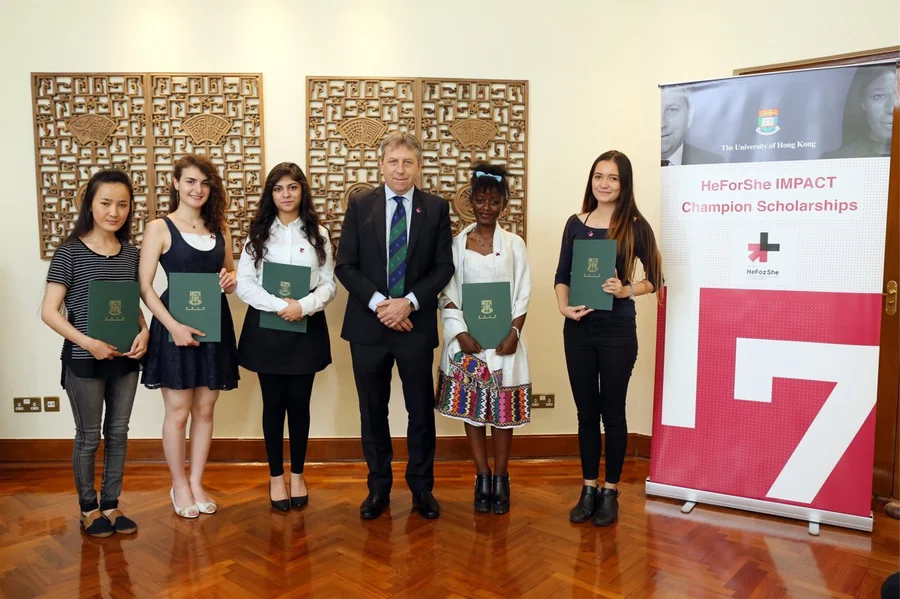 Five awardees at a luncheon hosted by Professor Peter Mathieson.
