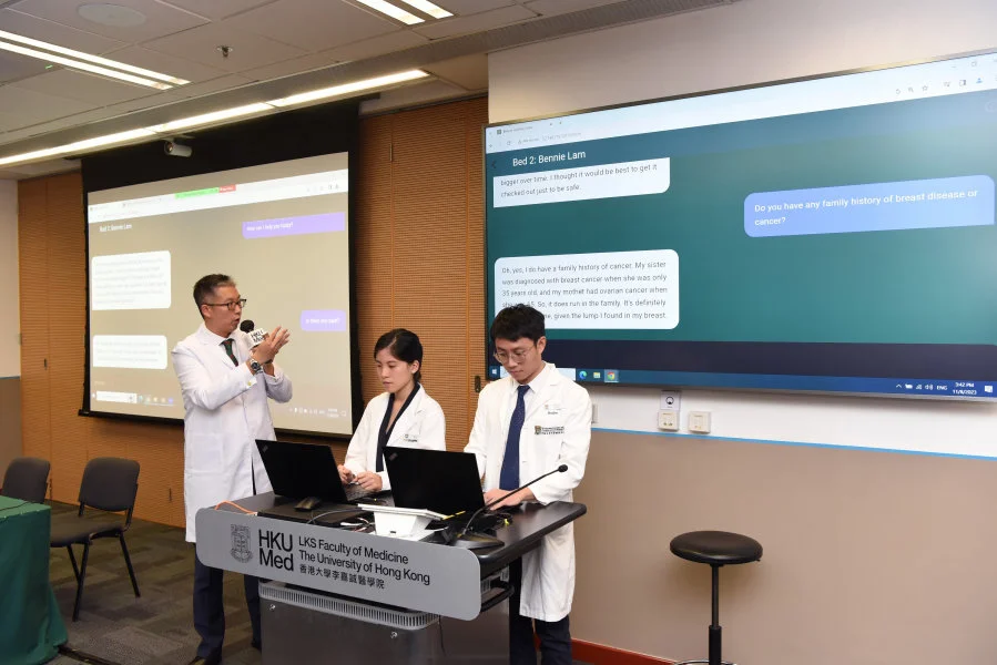 Dr Michael Co Tiong-hong (left) highlights the benefits of the ‘AI virtual patients’ diagnostic application in equipping medical students with diverse patient cases in a virtual learning environment.  