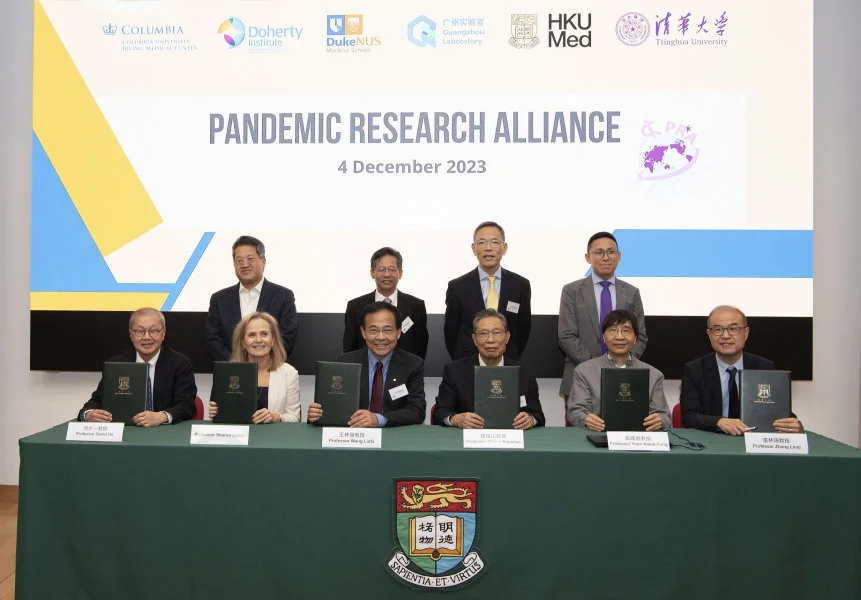 Leading global scientists from six leading institutions in four countries launched the Pandemic Research Alliance (PRA) to drive concerted research into respiratory viruses from animals to humans, improved surveillance, and new solutions to better manage the next pandemic. Joining the signing ceremony were: (front row, from left) Professor David Ho from Columbia University Irving Medical Center; Professor Sharon Lewin, Doherty Institute – University of Melbourne; Professor Wang Linfa, Duke-NUS Medical School; Professor Zhong Nanshan, Guangzhou National Laboratory; Professor Yuen Kwok-Yung, the University of Hong Kong (HKU); and Professor Zhang Linqi, Tsinghua University; witnessed by (back row, from left) Professor Roger Wu, Columbia University Irving Medical Center; Professor Chen Xinwen, Deputy Director, Guangzhou National Laboratory; Professor Chak-sing Lau, Dean of Medicine, HKU; and Mr Sim Zhimin, Director (International Partnerships and Strategy), Tsinghua Medicine, Tsinghua University.  