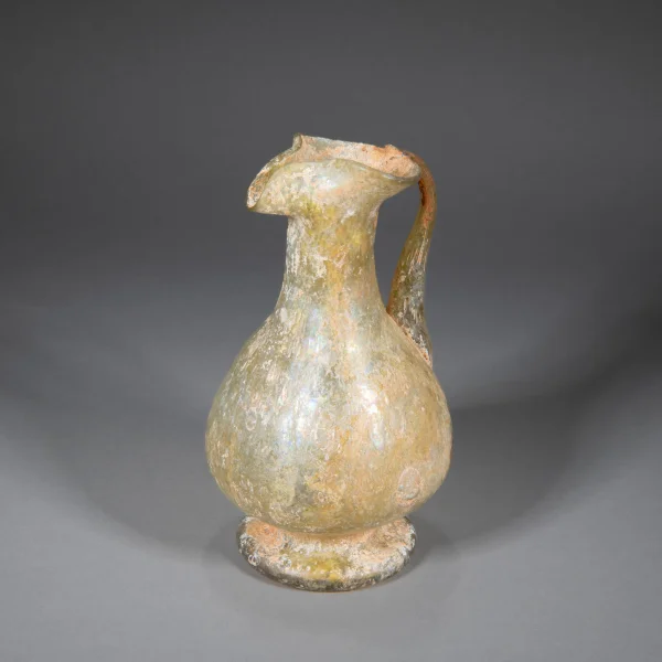 Ewer Blown, tooled and applied glass Islamic Persia (7th–8th century CE) or China (Tang dynasty (618–906) or Liao dynasty (907–1125)) Private Collection