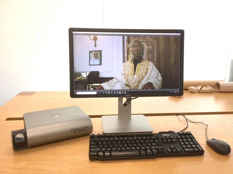 Figure 5. The Edge Computing AI Chip (with desktop machine) developed by Marvel Digital AI Limited.  