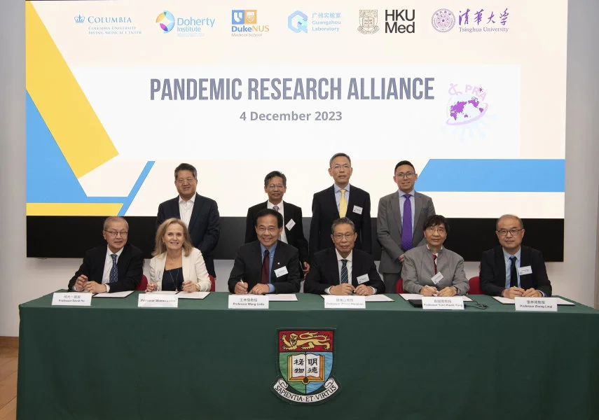 Leading global scientists from six leading institutions in four countries launched the Pandemic Research Alliance (PRA) to drive concerted research into respiratory viruses from animals to humans, improved surveillance, and new solutions to better manage the next pandemic. Joining the signing ceremony were: (front row, from left) Professor David Ho from Columbia University Irving Medical Center; Professor Sharon Lewin, Doherty Institute – University of Melbourne; Professor Wang Linfa, Duke-NUS Medical School; Professor Zhong Nanshan, Guangzhou National Laboratory; Professor Yuen Kwok-Yung, the University of Hong Kong (HKU); and Professor Zhang Linqi, Tsinghua University; witnessed by (back row, from left) Professor Roger Wu, Columbia University Irving Medical Center; Professor Chen Xinwen, Deputy Director, Guangzhou National Laboratory; Professor Chak-sing Lau, Dean of Medicine, HKU; and Mr Sim Zhimin, Director (International Partnerships and Strategy), Tsinghua Medicine, Tsinghua University.  