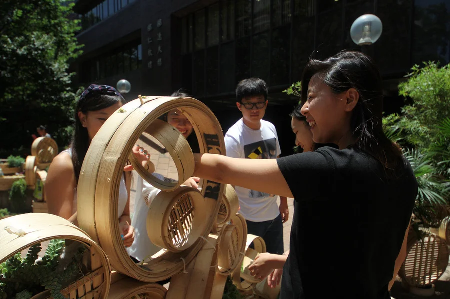 Nicole Choi and her team with the installation 