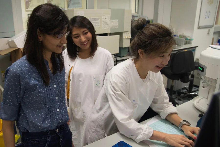 Dr Sumana Sanyal (left) and her team advance the understanding of viral infection mechanism on dengue fever and related flavivirus diseases.  