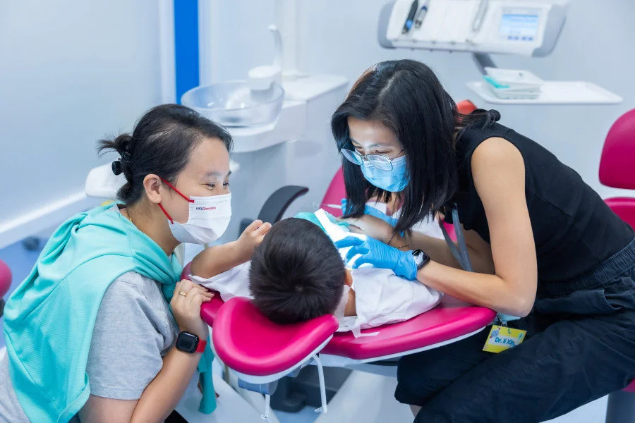 A child receives basic dental check-up at IAD-MSC.  