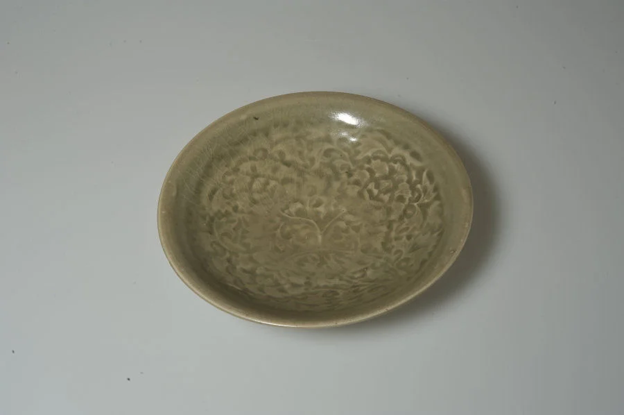 Dish: floral design Northern Song dynasty (960–1127 CE) Stoneware with celadon glaze HKU.C.1954.0107