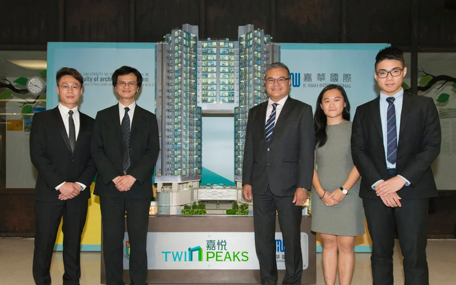 During the handover ceremony, undergraduate students from the HKU Department of Real Estate and Construction share their case study results in relation to TWIN PEAKS. (From left) Year 4 student Mr Wu Cheuk-lam; Professor Chau Kwong-wing, Head and Chair Professor of the Department of Real Estate and Construction, HKU; Mr. Tony Wan, General Manager (Hong Kong Properties); Year 3 student Miss Chan Cam-man and Year 4 student Hui Ting-fung.