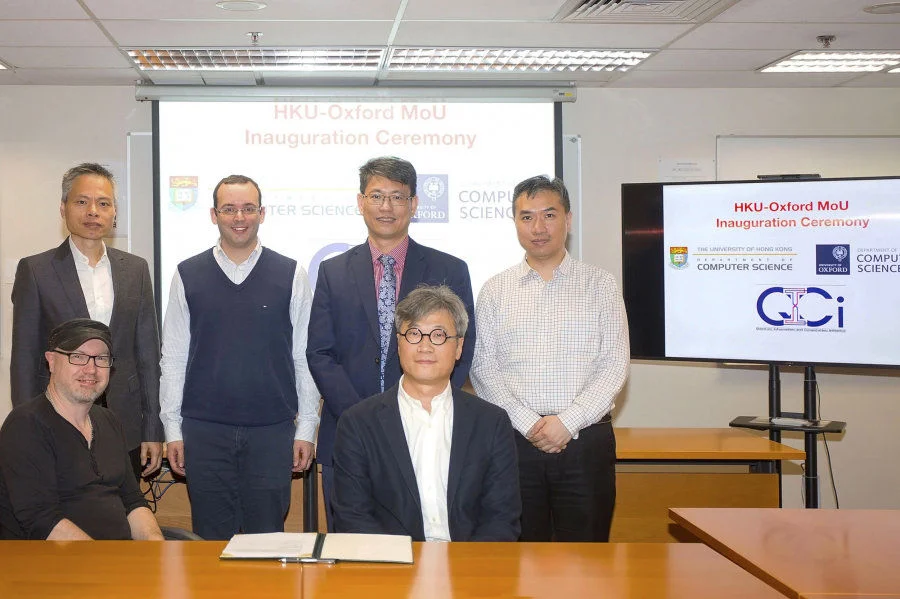 A group photo taken at the MoU signing ceremony on January 15, 2020. Back row: (from left) Professor Lam Tak-Wah, Professor Giulio Chiribella, Professor Christopher Chao and Dr Reynold Cheng. Front row: (from left) Professor Bob Coecke and Professor Alfonso Ngan.