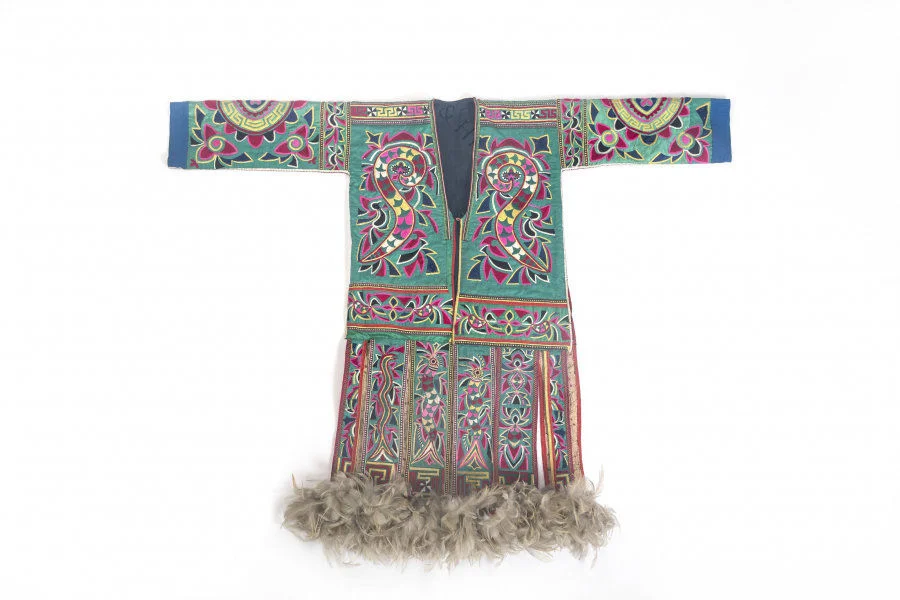 Dress for the Guzang Festival: named after the famous Miao people’s Guzang Festival; also known as the ‘big ox coat’ or ‘hundred bird clothing’.  