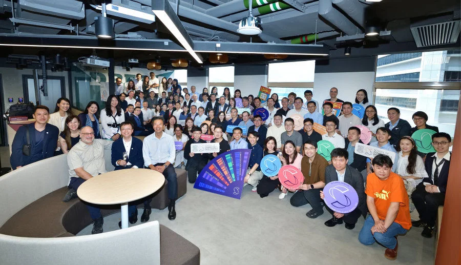 Faculty members and staff gather to celebrate the establishment of the School of Computing and Data Science.  