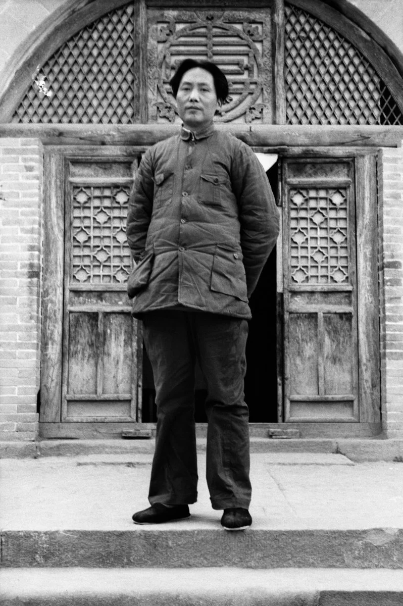 Mao Tse-tung in front of the entrance to the Red Academy.