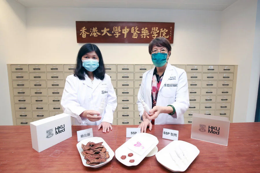 The research team of Dr Chen Jianping (right) and Dr Liu Li (left) discovered a broadly reactive SARS-CoV-2 entry inhibitor derived from Chinese medicine.   