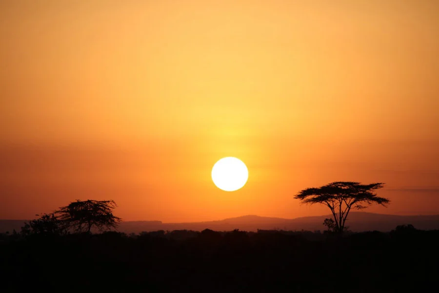 Sun rise in Kenya by Billy Hau