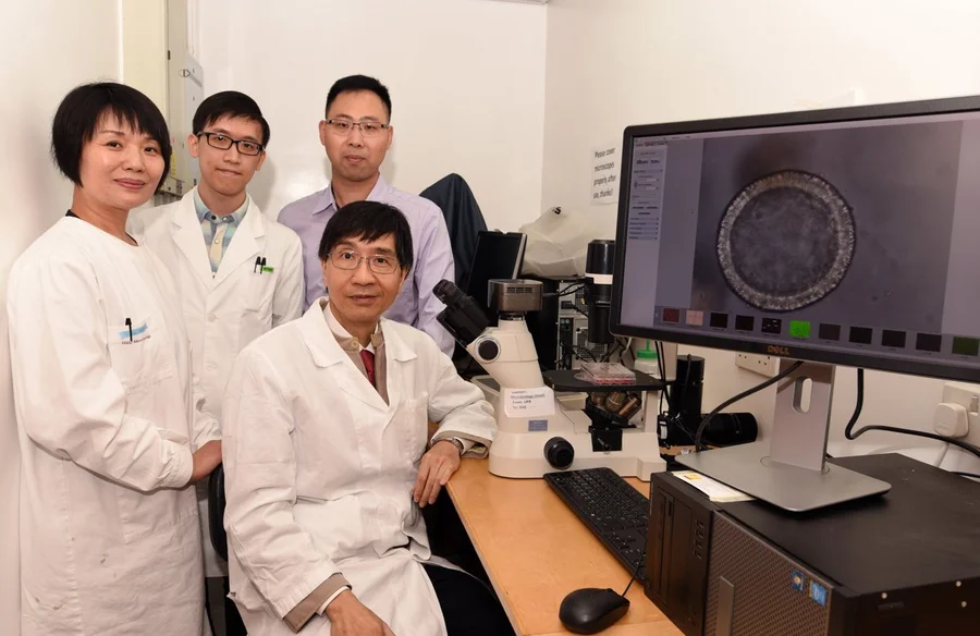 Group photo of Professor Yuen (front), Dr Zhou (left) and the research team members.