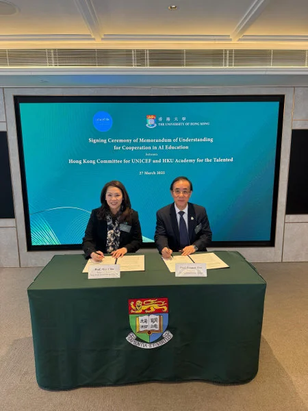 Prof May Chiu, Executive Director of UNICEF HK (Left) and Prof Bennett Yim (Right), Chairman of HKU AcT signed an MoU to empower youth in AI education.