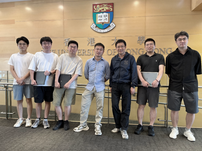Professor Shiming Zhang (third from the right), Professor Jingqiang Wang (fourth from the right) and research team members   